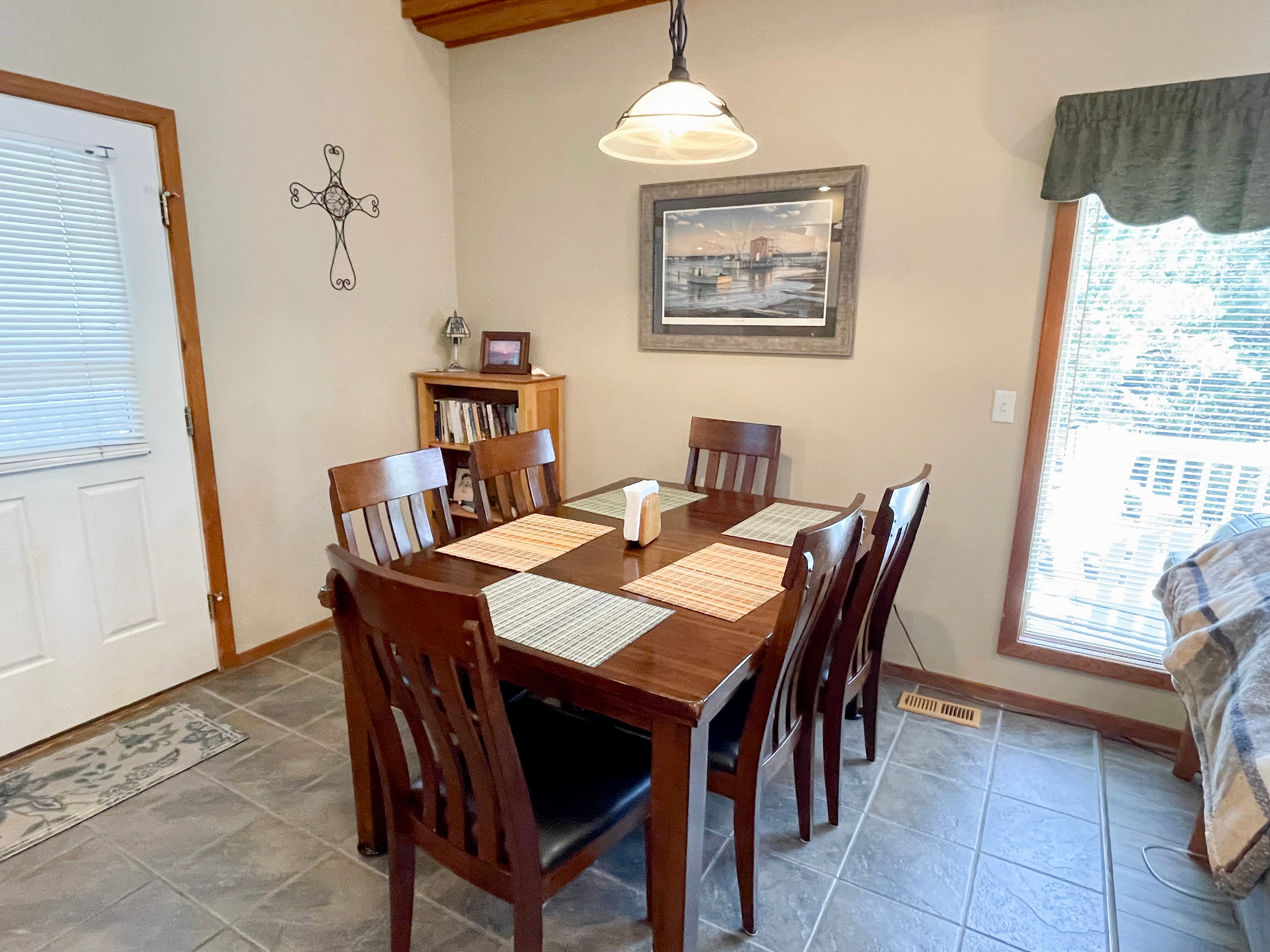 Dining Area, First Floor with Screened Porch and Deck Access