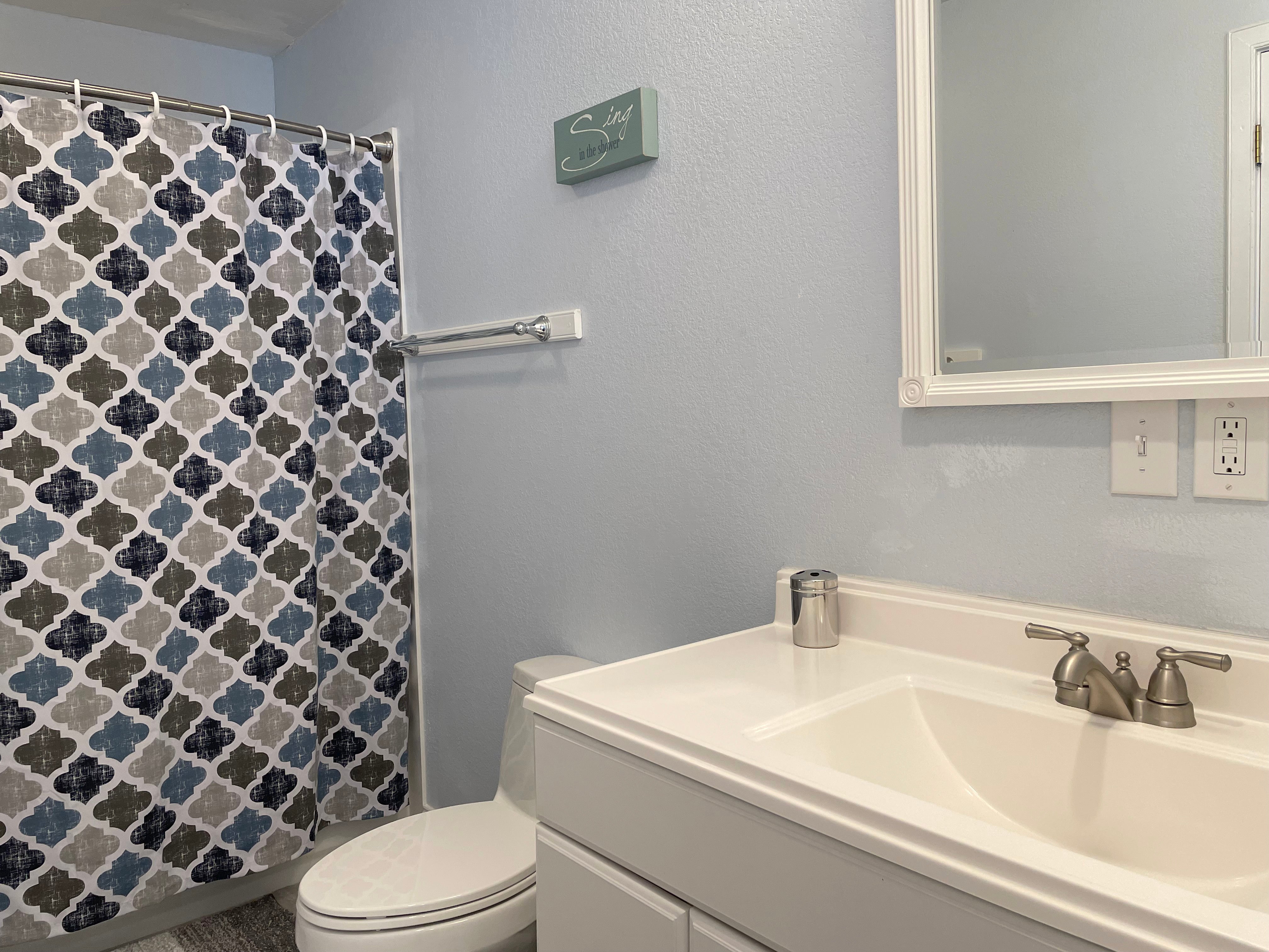Full Bath with Tub/Shower, First Floor (Hallway and Bedroom Entry)