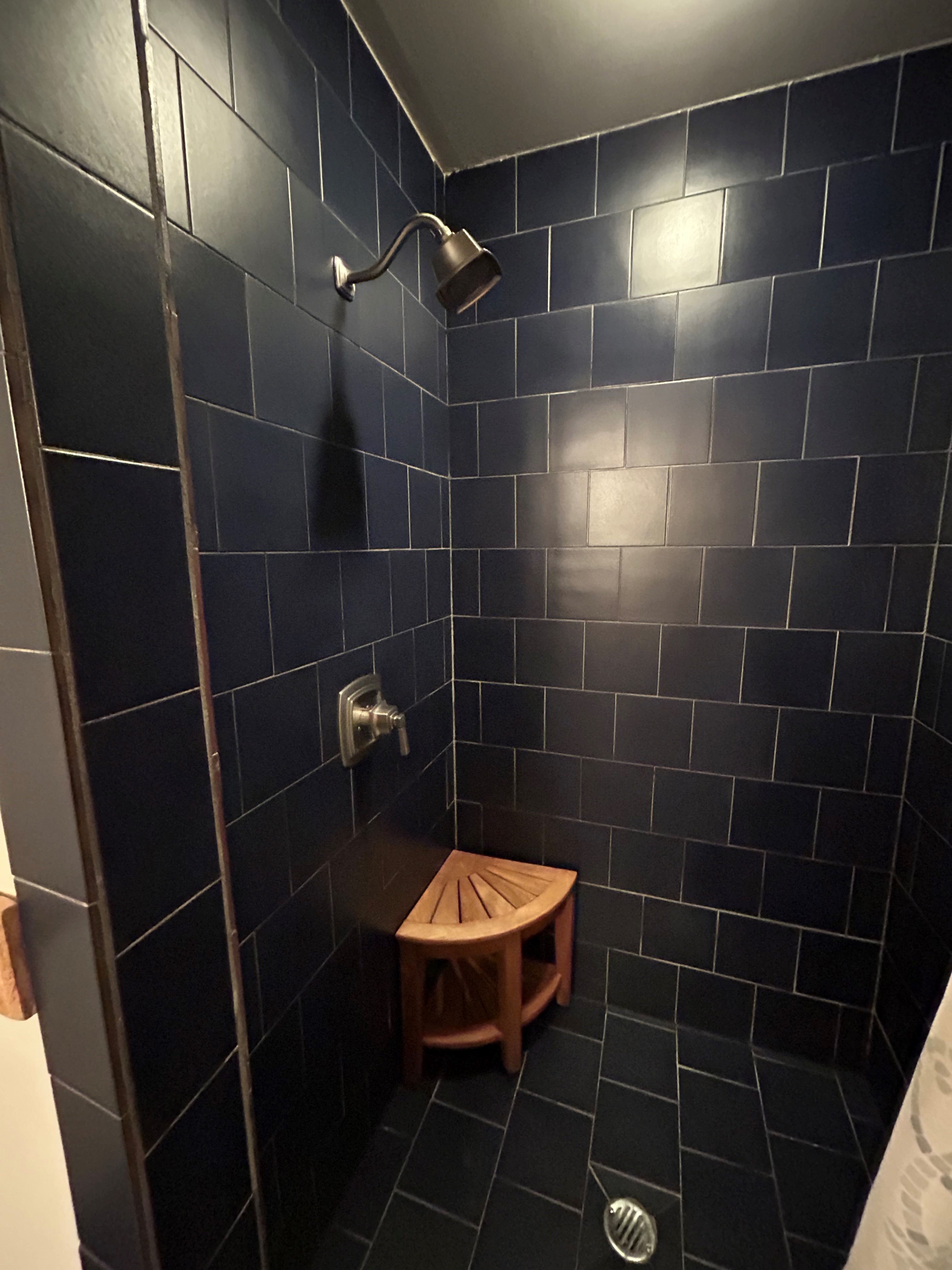 Full bath off Hallway Tiled Shower adn Washer Dryer