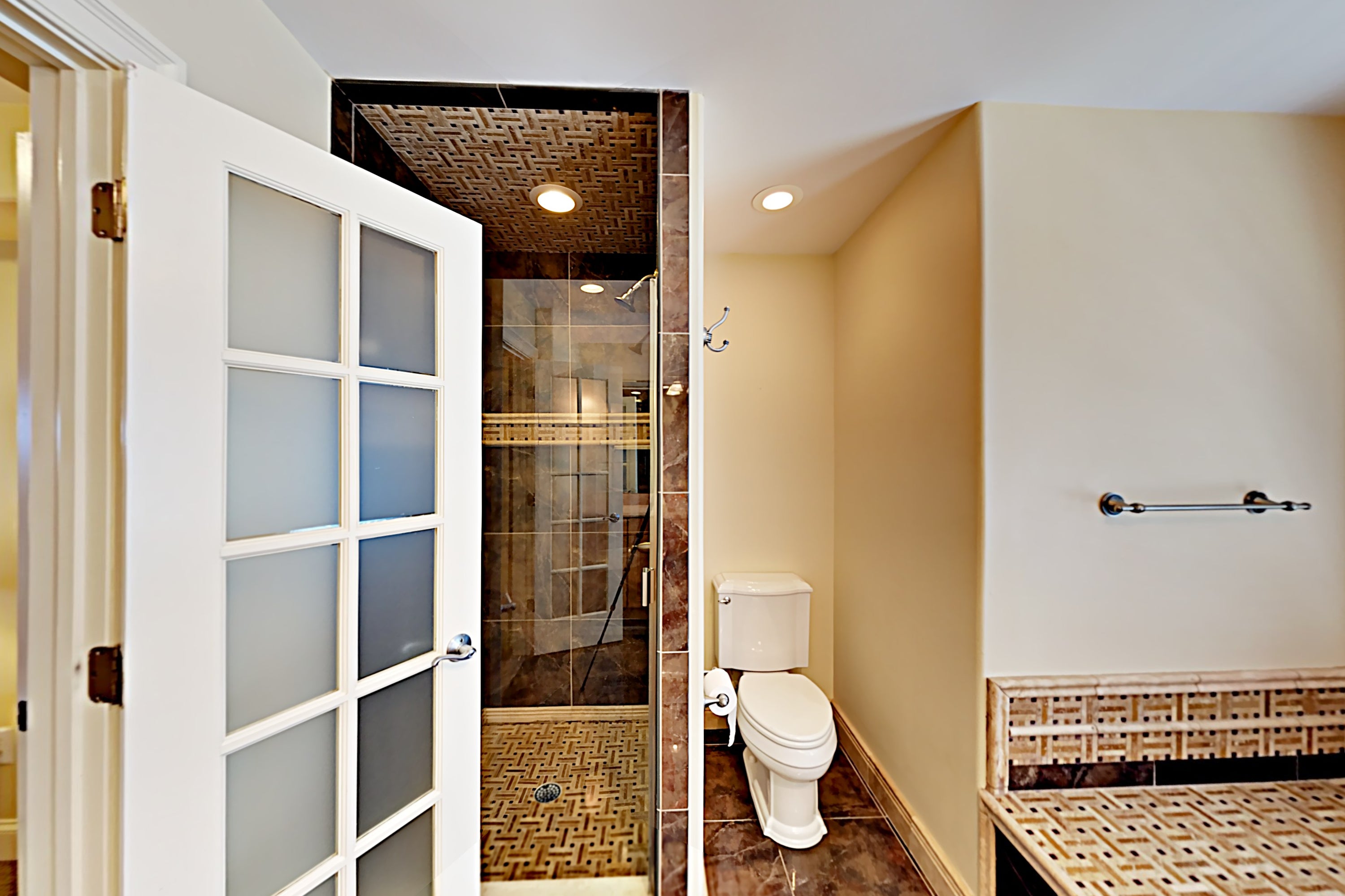Master Bathroom with Stall Shower and Soaking Tub