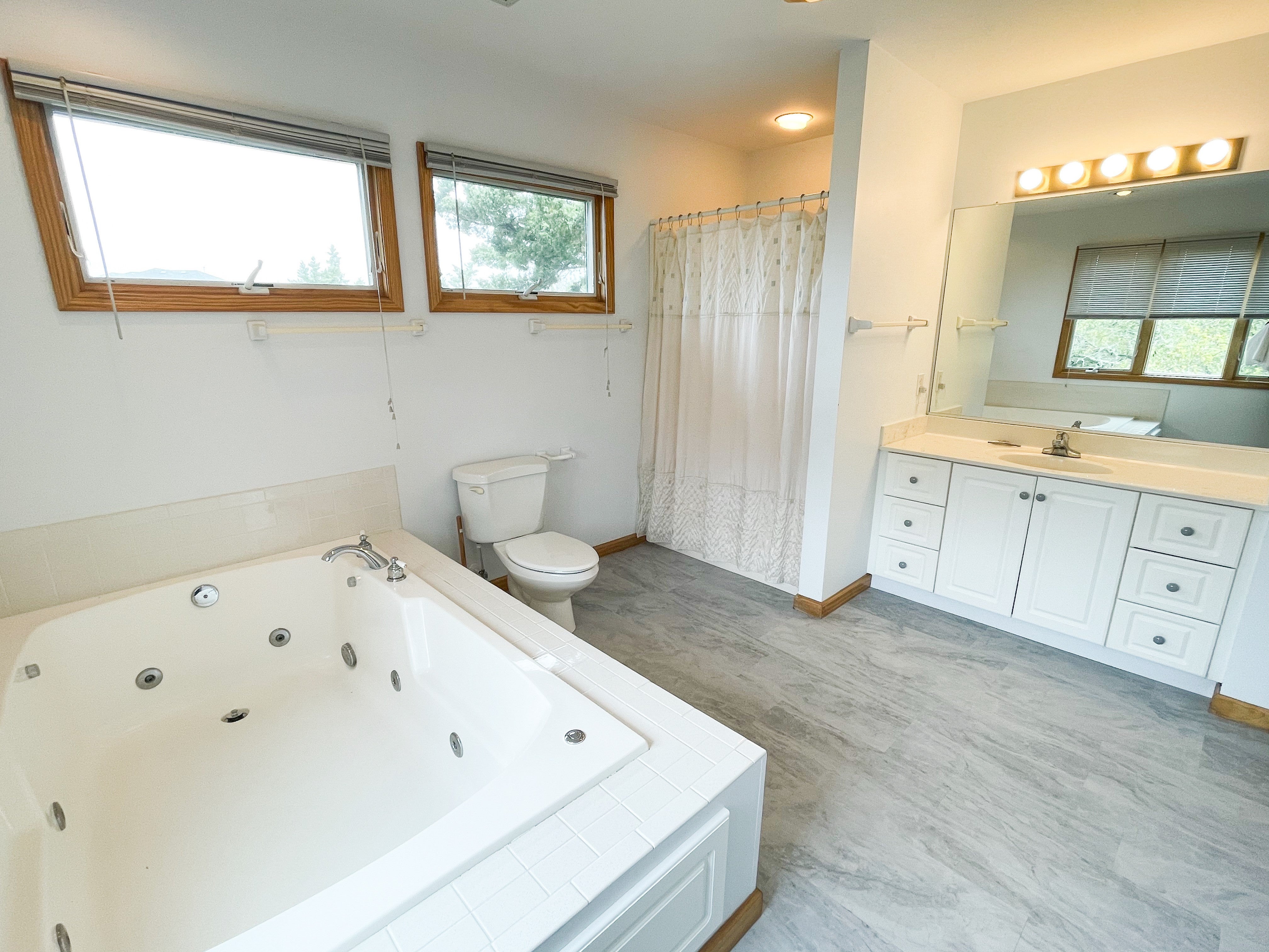 Primary Bath with Shower Stall and Whirlpool Tub, Second Floor