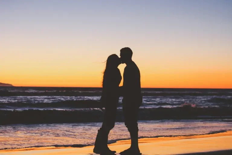 Sunset couple on beach